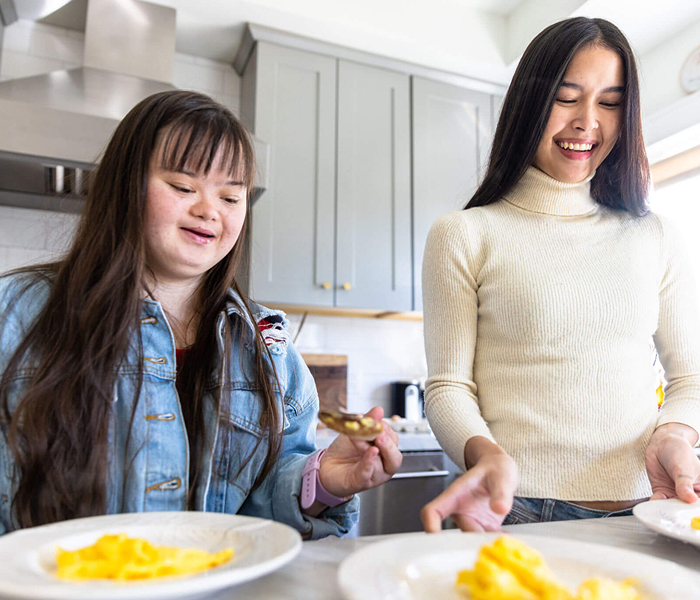 What is Assistance with Daily Tasks in Shared Living?